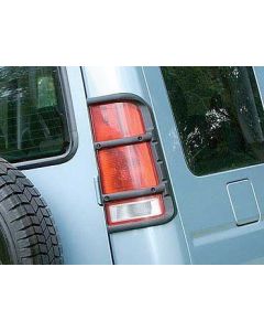 Ochraniacze lamp tył (w błotniku) Discovery II od 2003 (para) - STC53194